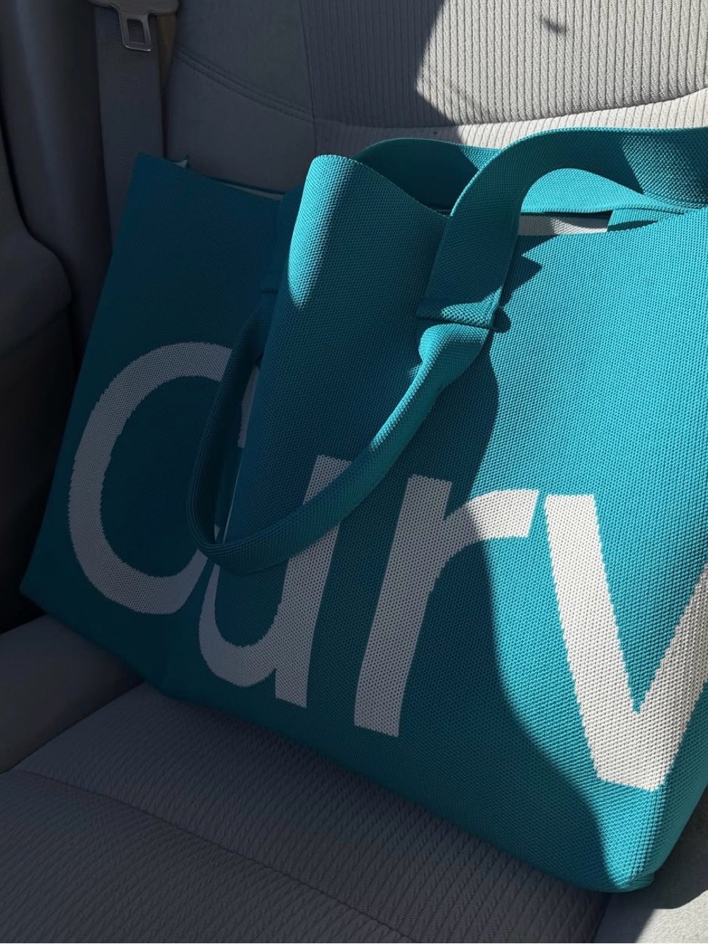 Curve by Sean Brown Emerald knitted tote